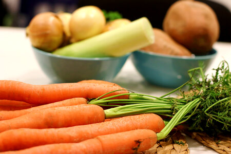 Carrot close up with other vegetables for soup photo