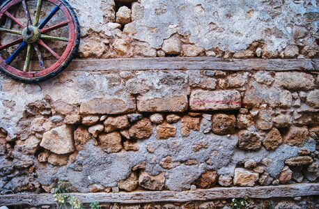 Wheel wall old stone photo