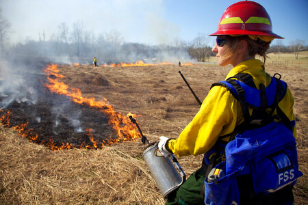 Firefighter with torch in hand