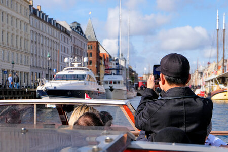 Tourist Taking Photos on Copenhagen Canal Tour photo
