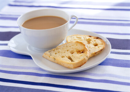 Slices of toasts, coffee cup