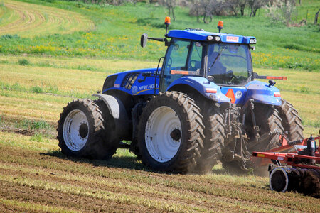 Tractor on farm photo