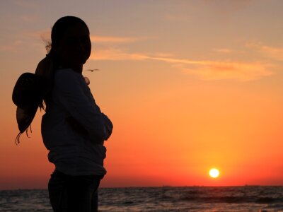 Woman Silhouette at Sunrise