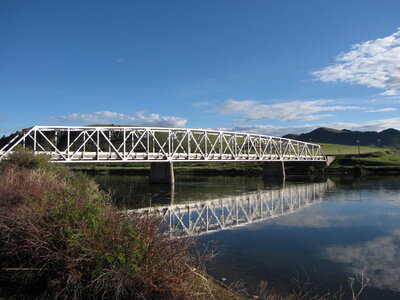 the river on steel bridge photo