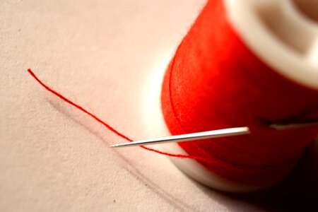 Red sewing sewing needle