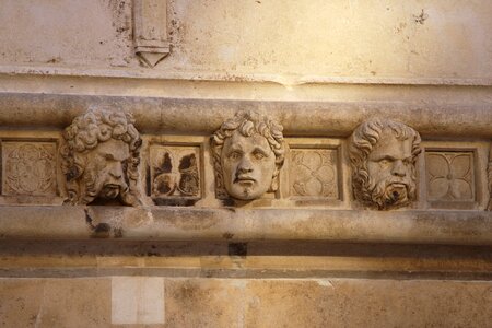 Cathedral faces stone photo