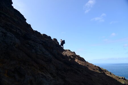 Hikers on Kalalau trail in Kauai, Hawaii