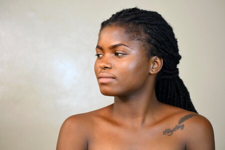 Woman facial expression braids photo