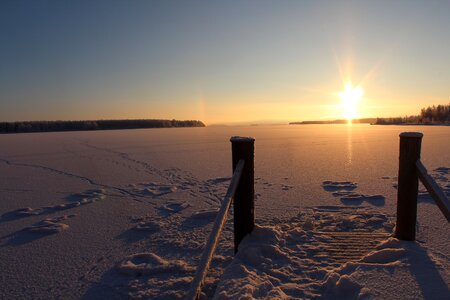 Sunshine winter landscape frozen lake photo