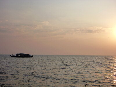 Houseboat On Sea Horizon photo