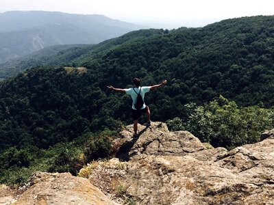 Cliff man mountain photo