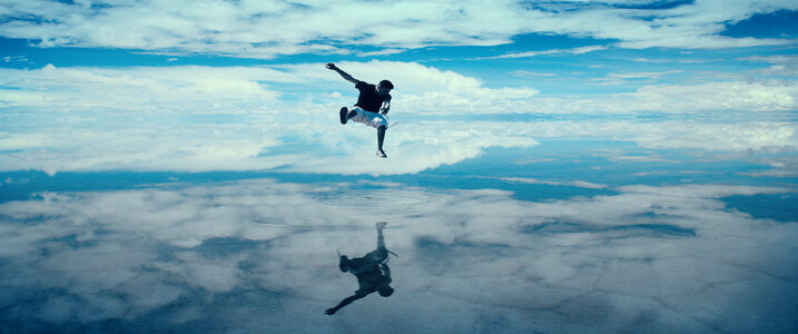 Jump into the Clouds above Water photo