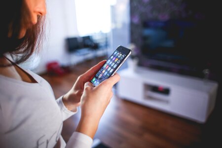 Beautiful young woman using smart phone