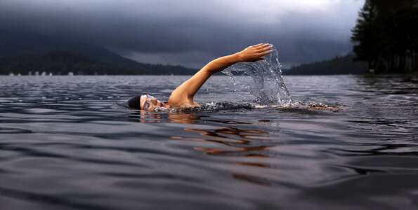 Swimmer in lake photo
