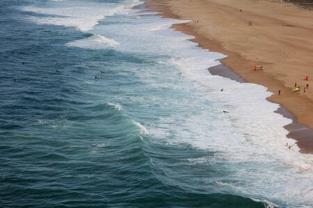 Wave of the Ocean on the Sand Beach photo