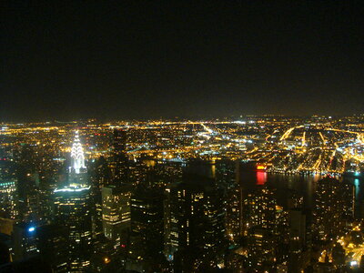 New York City skyline at night with Empire State Building photo