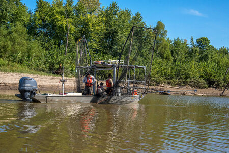 U.S. Fish and Wildlife Service boat, The Magna Carpa, searching for invasive carp photo