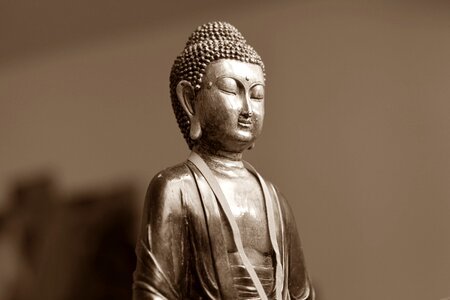 Spiritual statue brown meditation photo