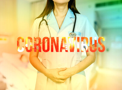Doctor woman with white coat and stethoscope. Coronavirus. photo