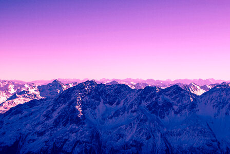 Mountain landscape under purple sky photo