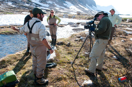 Videographer interviews biologist-1 photo