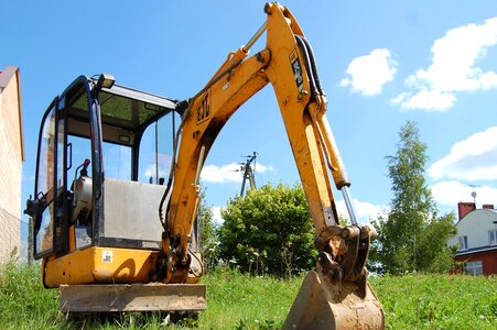Excavator flora grass