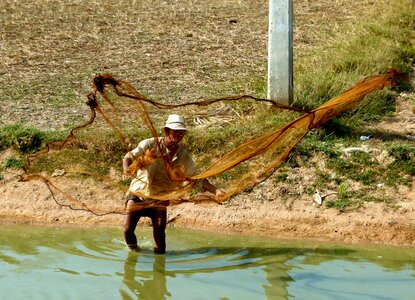 Fisherman fishing net fishing photo