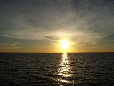 Sun setting sun water