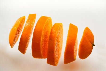 Orange slices on white background. photo
