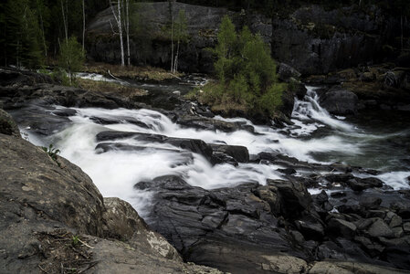 Time-Lapse of cascading water splashing down rocks at Cameron Falls, Ingraham Trail photo
