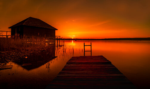 Red Sunset with house and docks photo