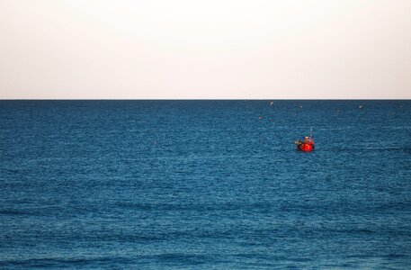 Boat in the sea photo