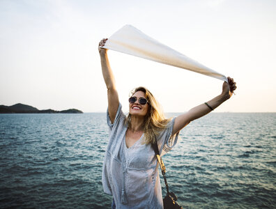 Joyful Woman on the Seashore photo