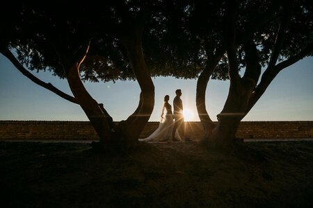 Walking sunset just married photo