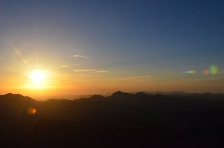 Mountain top sky clouds photo