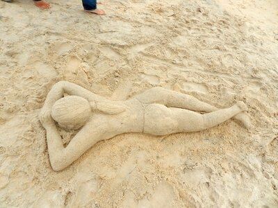Woman sand art figure