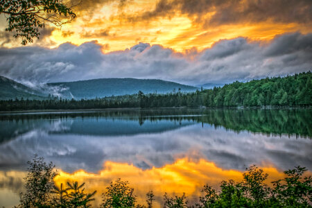 Sunrise over the lake and mountains in the Adirondacks