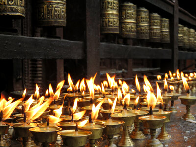 Candlelight offerings in the temple in Kathmandu, Nepal photo