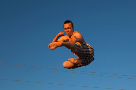 Young jumping man photo