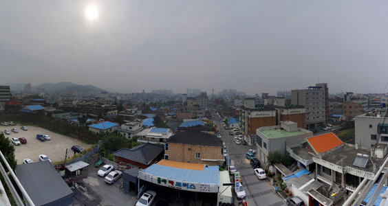 Cityscape under grey skies in Asan, South Korea photo