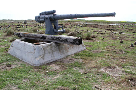 Part of pier washed onto Eastern Island gun photo