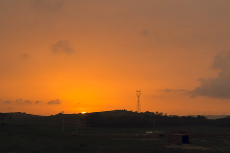 Rural Sunset with orange sky photo