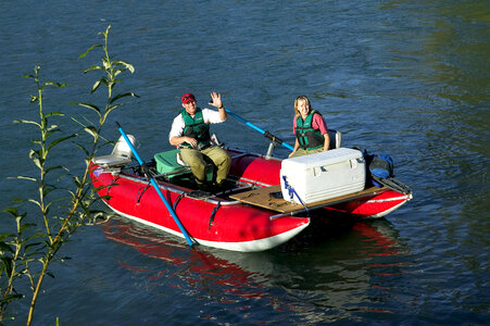 Couple sightseeing by pontoon boat