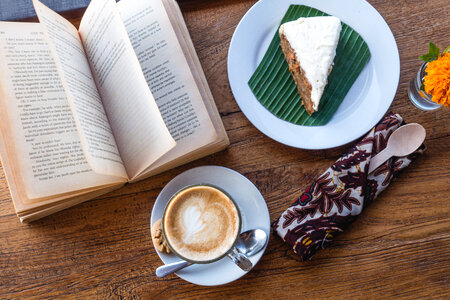 Relaxing with coffee, cake and book photo