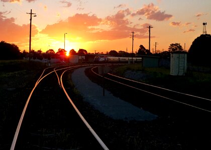 Sunset train train station photo