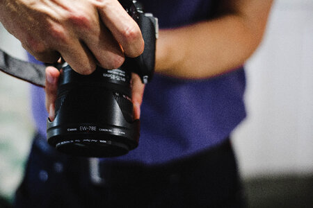 Photographer Holding Camera