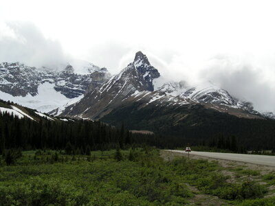 rocky mountains and road in jasper national park photo