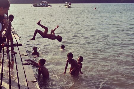 Swimming jumping fun photo