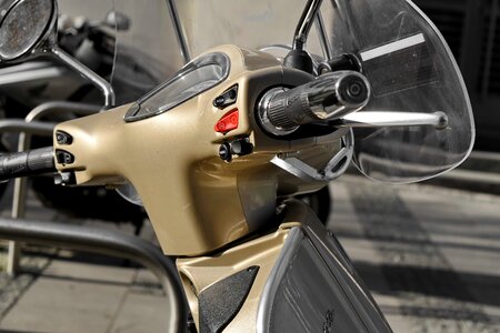 Motorcycle steering wheel windshield