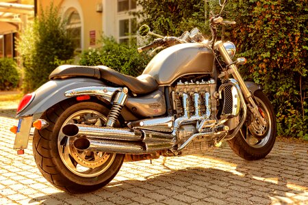 Two wheeled vehicle cylinder exhaust system